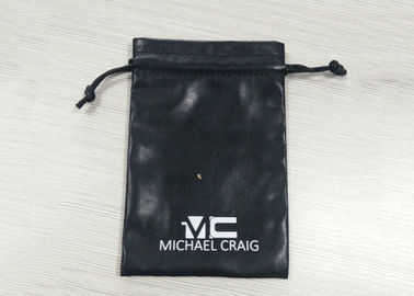 China Schwarze lederartige Zugschnur-Schmuck-Taschen, Veloursleder-Zugschnur-Beutel-Siebdruck-Logo usine